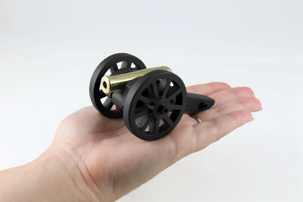 Cannon+in+hand+black.jpg