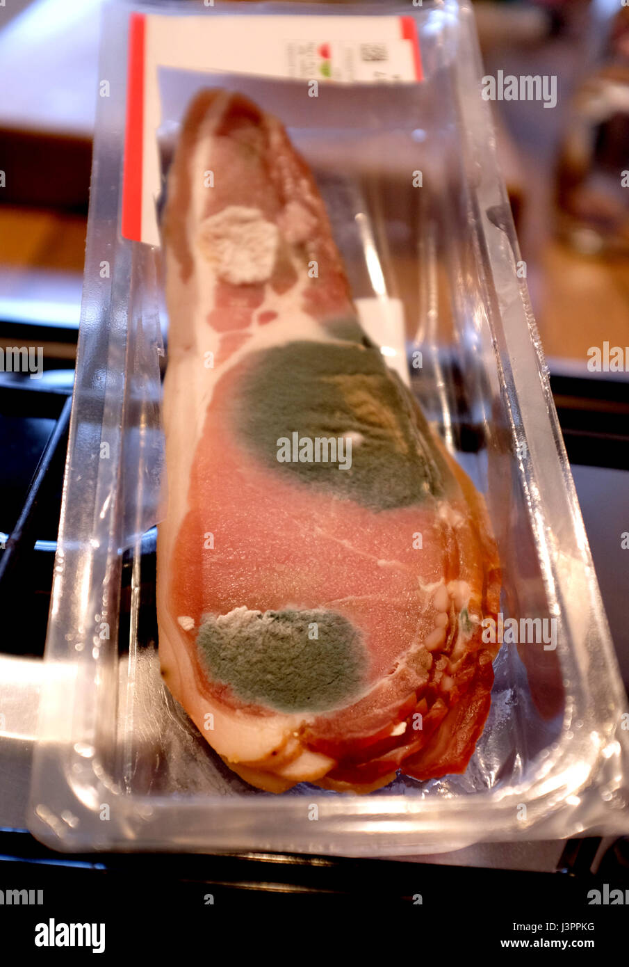 shop-bought-bacon-that-has-gone-off-and-turned-mouldy-after-sell-by-J3PPKG.jpg