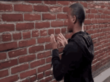 talking to a wall.gif